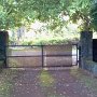 From inside the compound, looking at the closed gate.